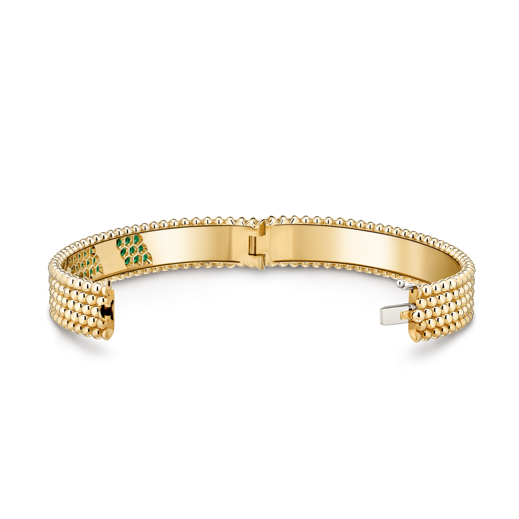 Van Cleef & Arpels Perlée collection five-row gold bead bracelet set with emeralds