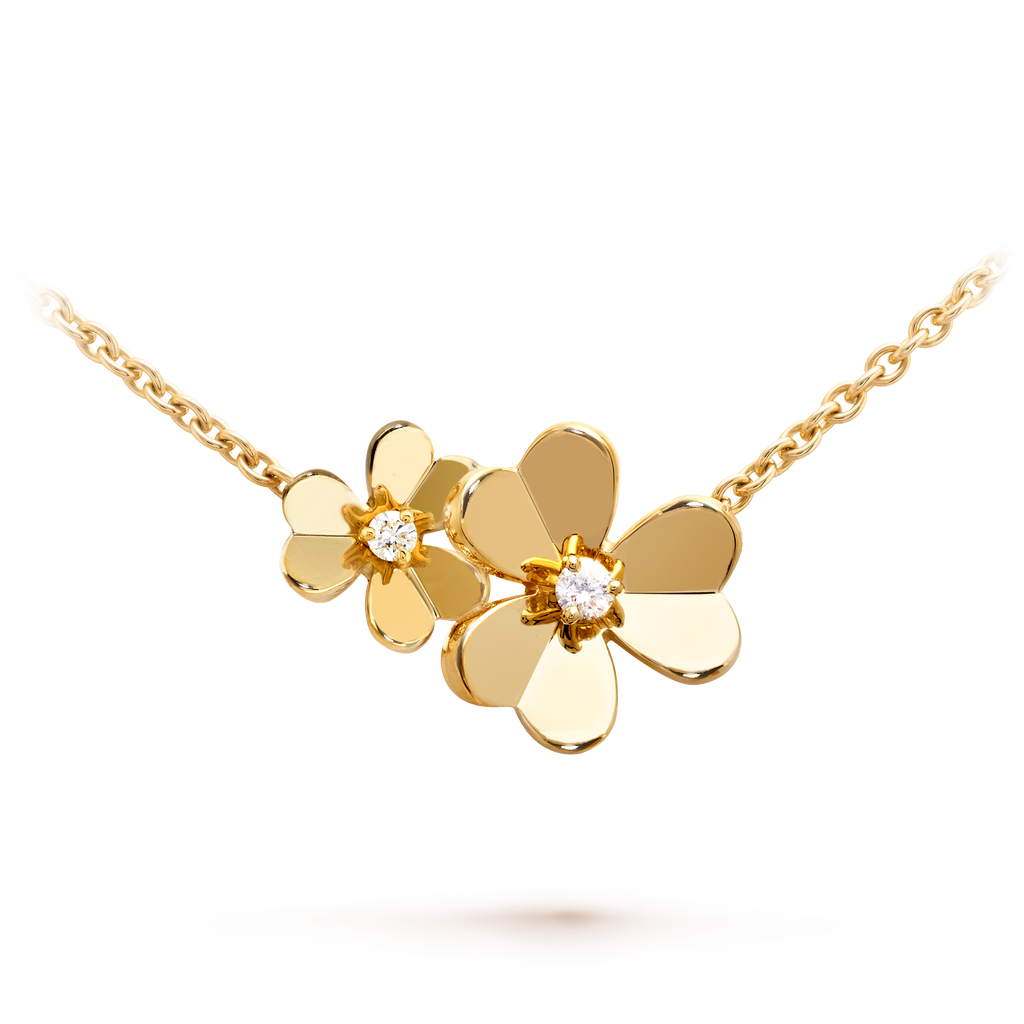 Van Cleef & Arpels Cosmos collection flower necklace in yellow gold and diamonds.