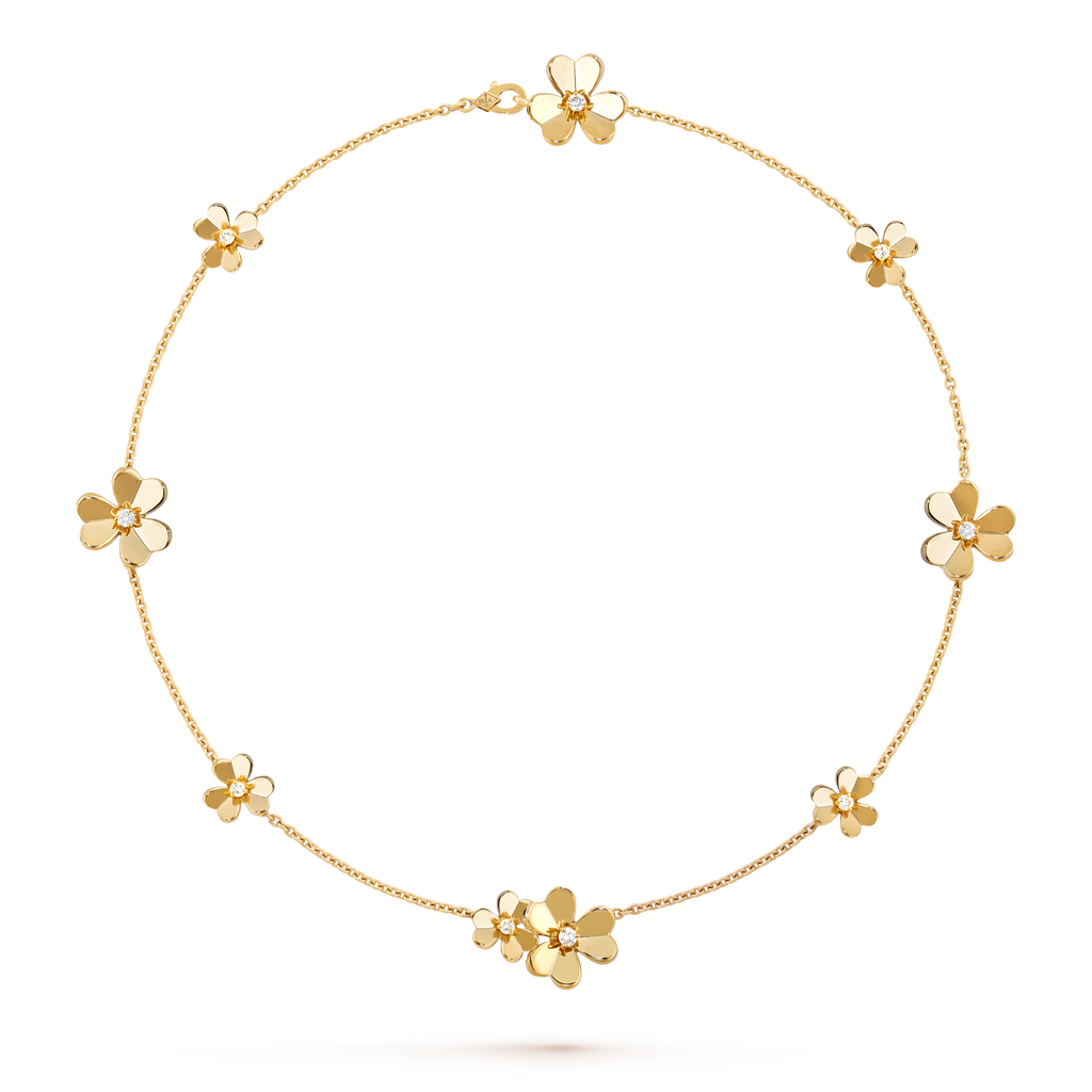 Van Cleef & Arpels Cosmos collection flower necklace in yellow gold and diamonds.