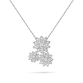 This is a Van Cleef & Arpels Cosmos collection pendant necklace in white gold featuring three flower motifs.