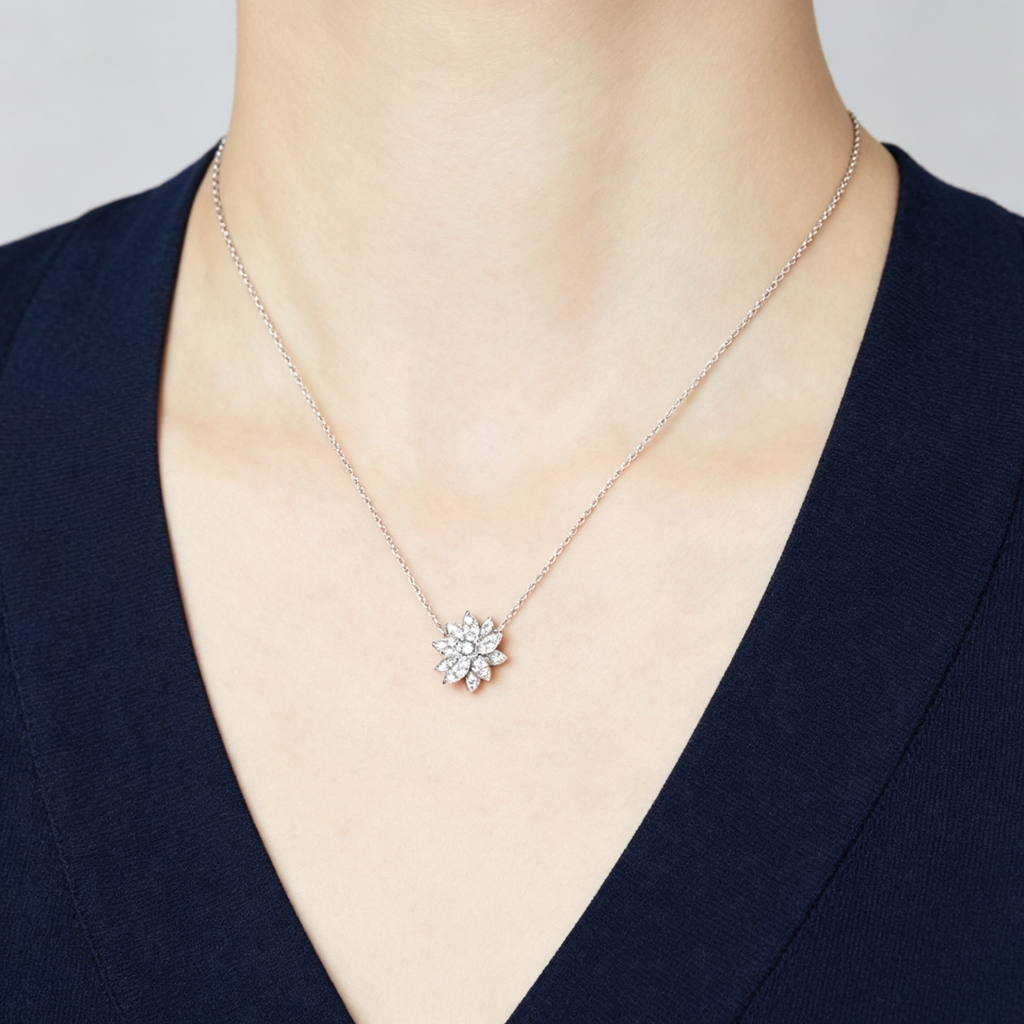 Van Cleef & Arpels Lotus collection small-model lotus necklace, fully set with diamonds.