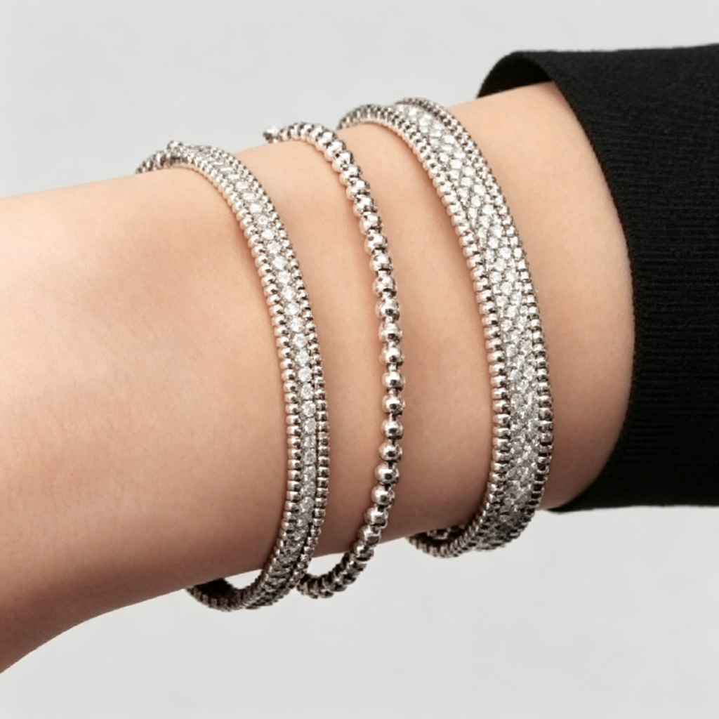 Van Cleef & Arpels Perlée collection three-row bracelet