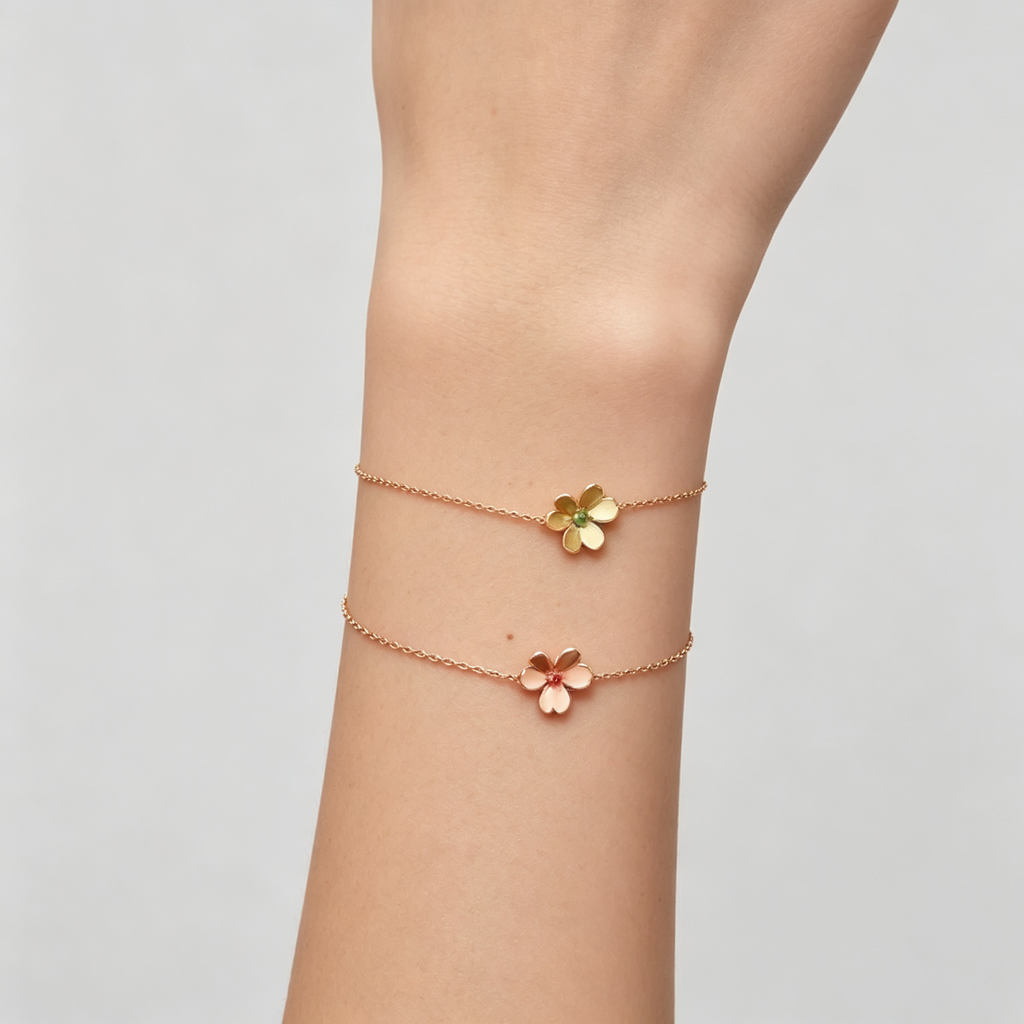 Van Cleef & Arpels Frivole mini bracelet, rose gold set with a ruby.