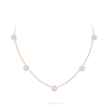 Van Cleef & Arpels Fleurette necklace featuring five diamond-pavé floral motifs.