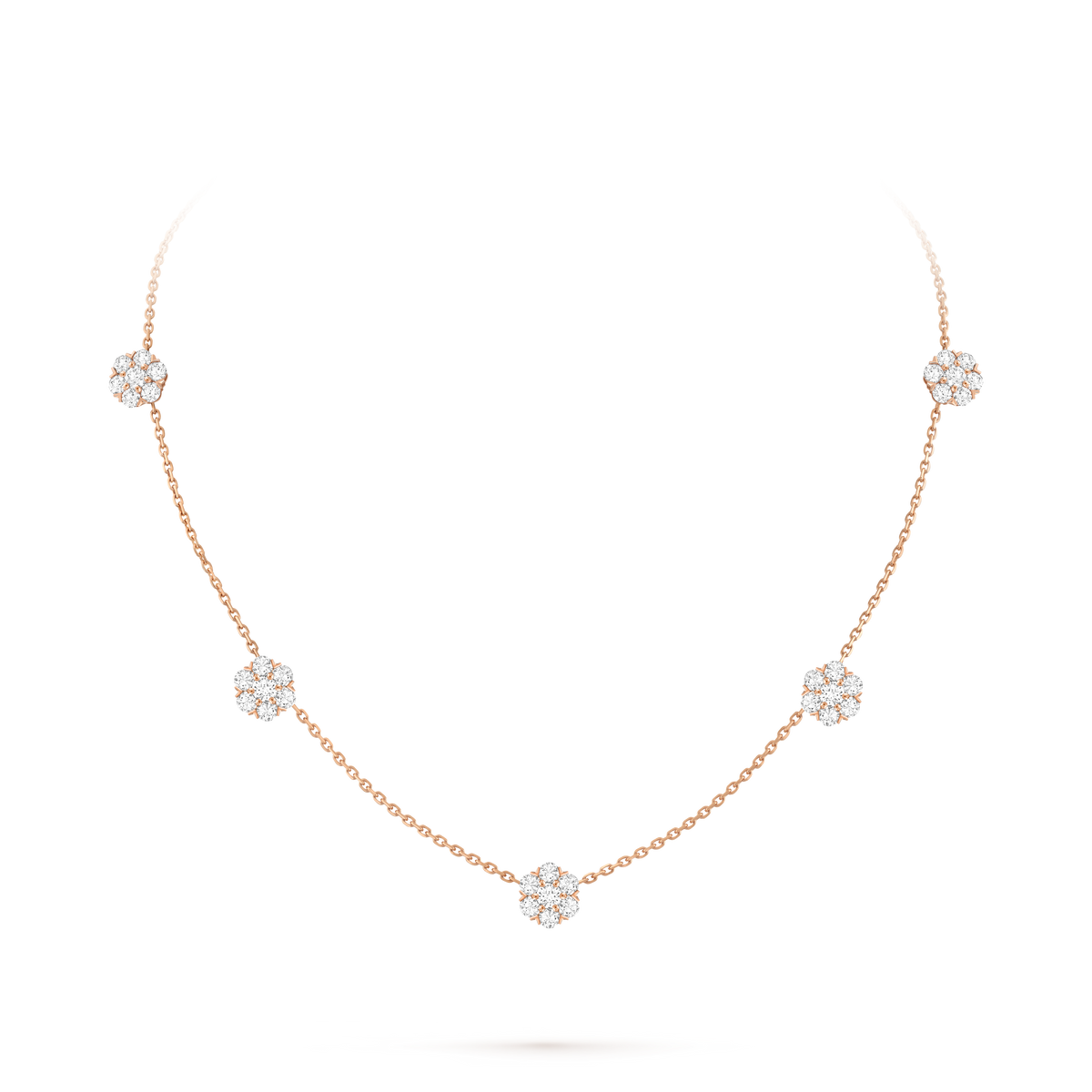 Van Cleef & Arpels Fleurette necklace featuring five diamond-pavé floral motifs.