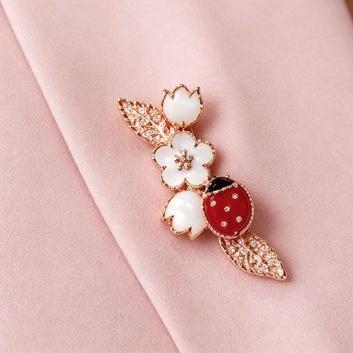 Van Cleef & Arpels Lucky Spring collection rose gold brooch featuring ladybug and flower motifs.